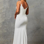 The back of a bride wearing a Crepe Fit and Flare Wedding Dress