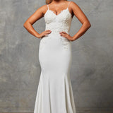 Bride wearing a Crepe Fit and Flare Wedding Dress