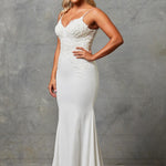 Bride wearing a Crepe Fit and Flare Wedding Dress