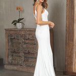 Bride wearing a Crepe Fit and Flare Wedding Dress