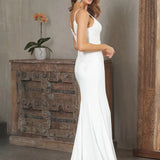 Bride wearing a Crepe Fit and Flare Wedding Dress
