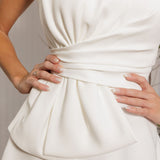 Close-up of Austin ivory bridal gown with pleated waist and minimalist design