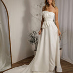 Austin minimalist wedding dress with strapless bodice and sleek ivory silhouette