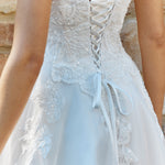 Close-up of a Lace A-Line Wedding Dress with lace details.