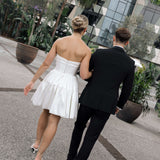 Bardot wedding dress in Brisbane featuring strapless neckline and playful mini silhouette