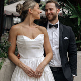 Bardot wedding dress in Brisbane featuring strapless neckline and playful mini silhouette