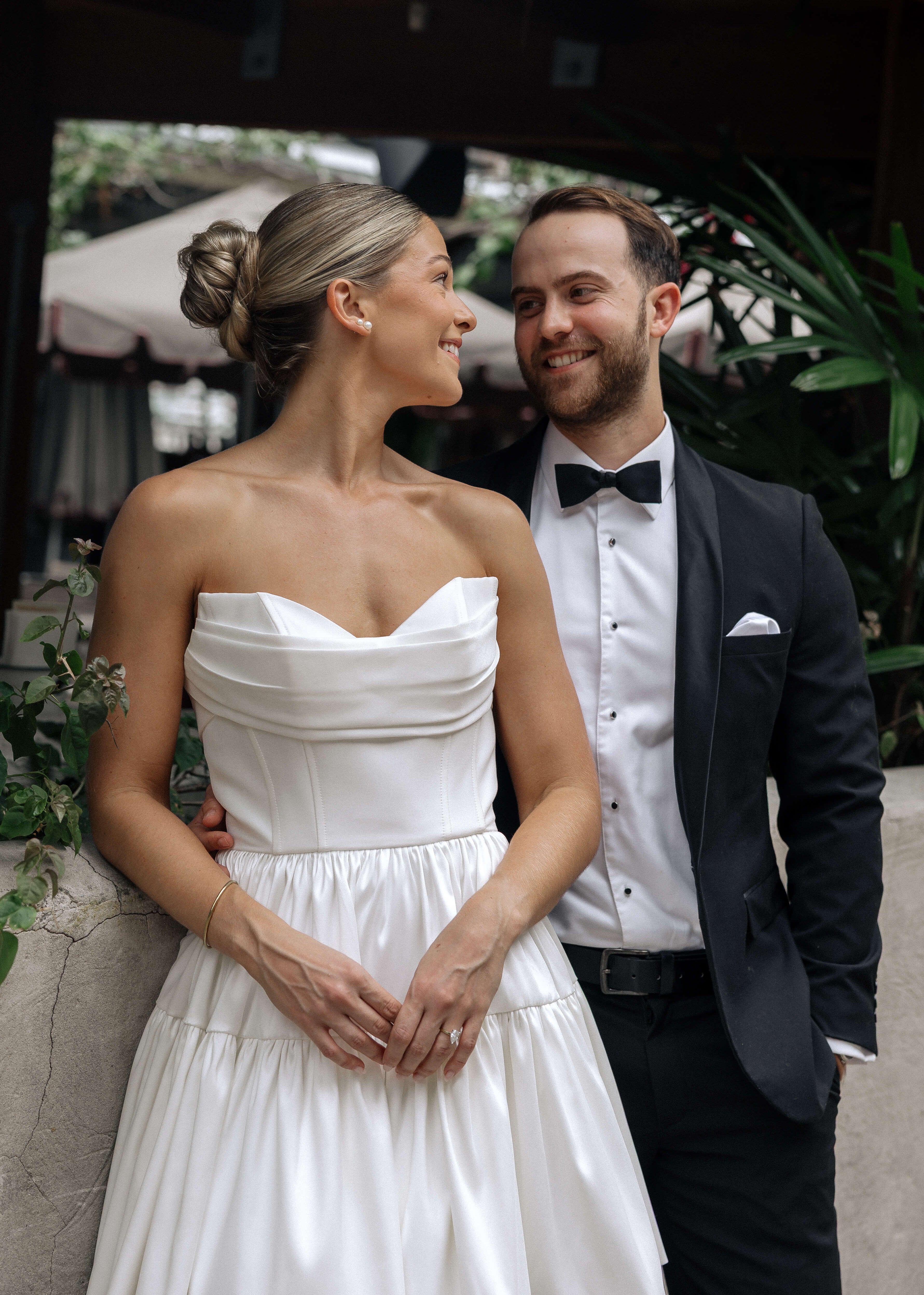 Bardot wedding dress in Brisbane featuring strapless neckline and playful mini silhouette