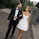 Bardot wedding dress in Brisbane featuring strapless neckline and playful mini silhouette