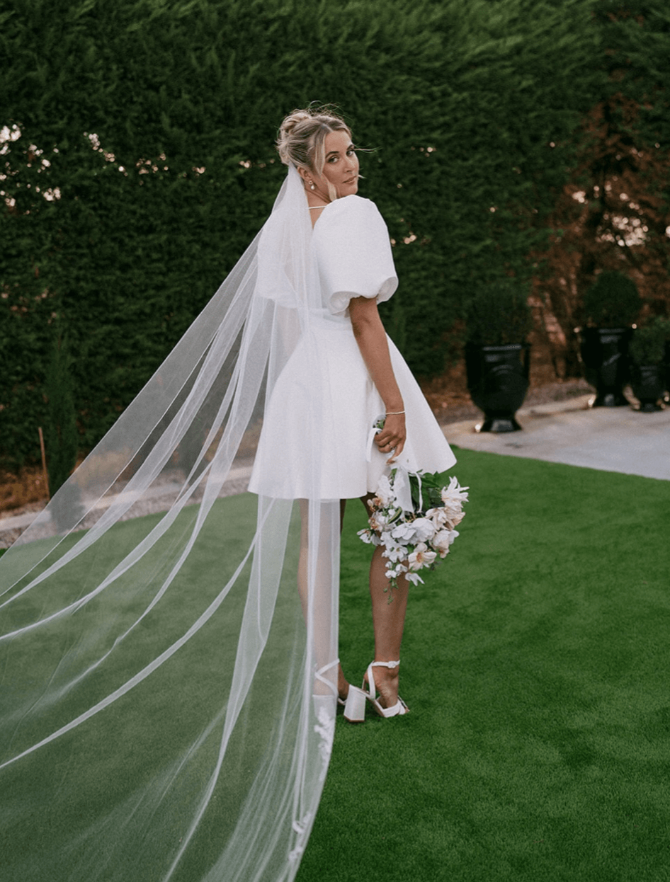 Belle Mini wedding dress in Brisbane featuring short A-line silhouette and puff sleeves