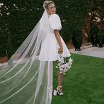 Belle Mini wedding dress in Brisbane featuring short A-line silhouette and puff sleeves