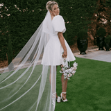 Belle Mini wedding dress in Brisbane featuring short A-line silhouette and puff sleeves