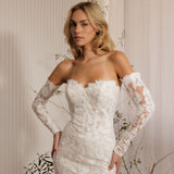 Ivory lace off-the-shoulder delicate beaded lace statement gown wedding dress with long lace sleeves and fitted silhouette