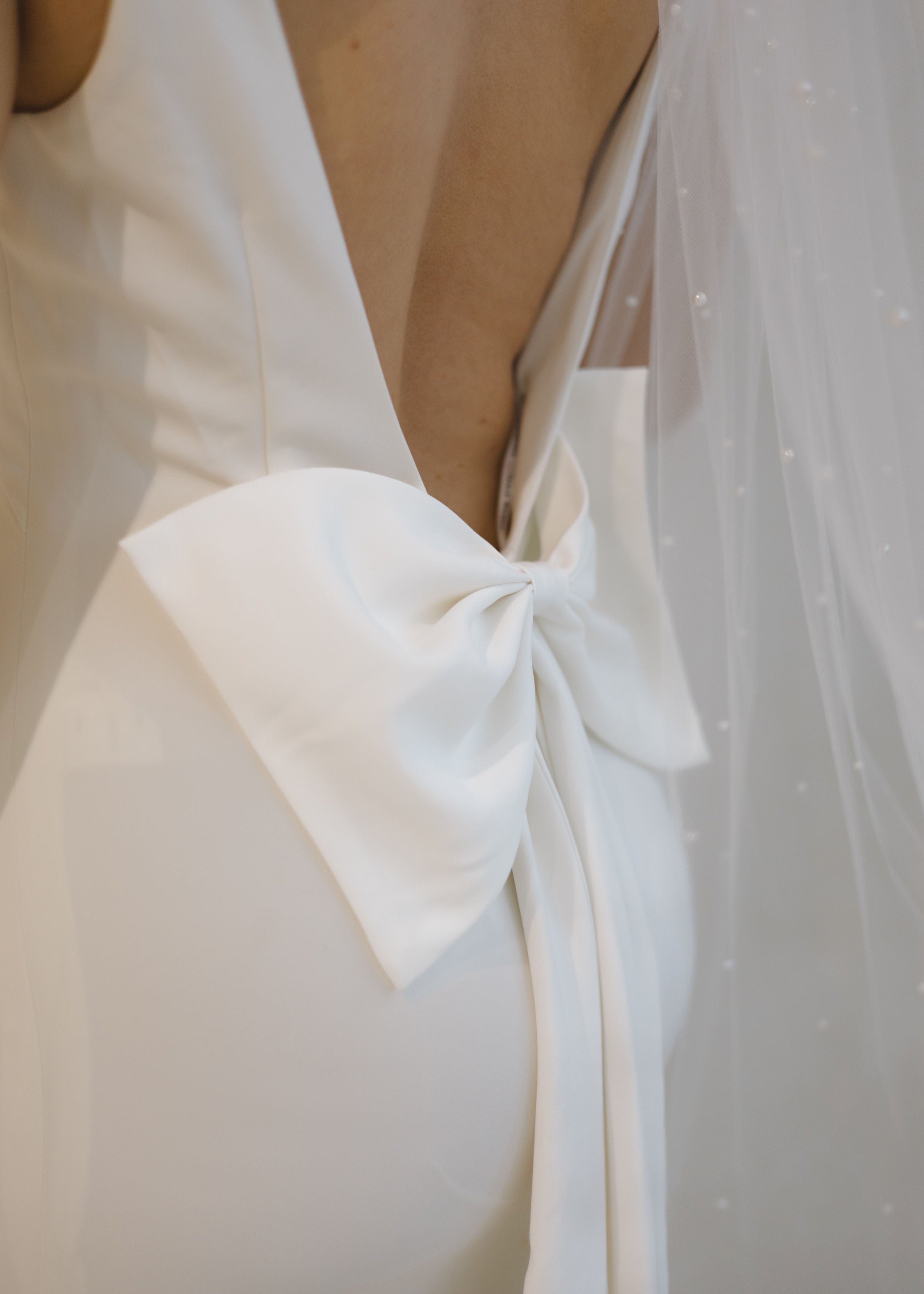 Detail shot in a Crepe Fit and Flare Wedding Dress