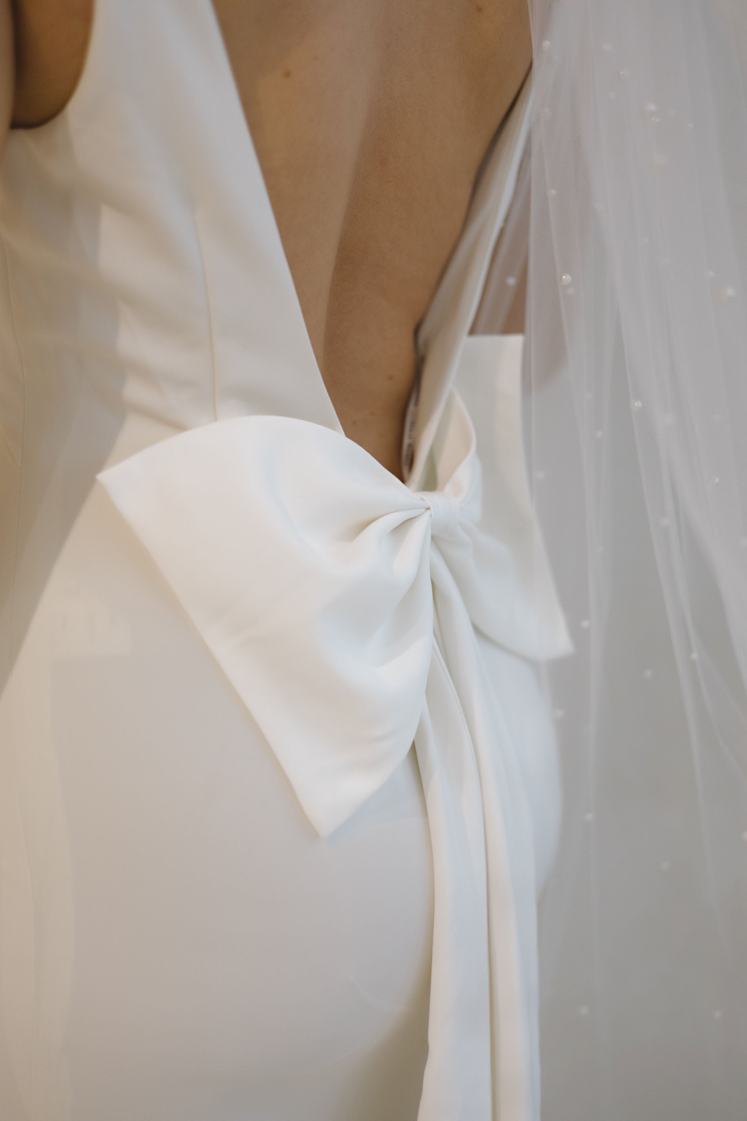Detail shot in a Crepe Fit and Flare Wedding Dress