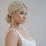 Side profile of a bride in a Beaded A-Line Wedding Dress