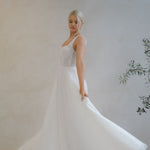 Bride spinning in a Beaded A-Line Wedding Dress
