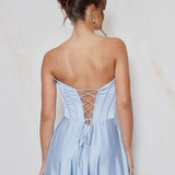 Celine satin A-line formal dress back view with strapless corset bodice, lace-up back detail and flowing satin skirt.