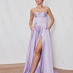 Celine satin A-line formal dress in lilac with strapless corset bodice and structured flowing skirt.