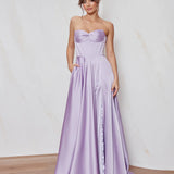 Celine satin A-line formal dress in lilac with strapless corset bodice and structured flowing skirt.