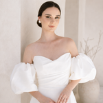 Heston wedding dress with strapless bodice and detachable puff sleeves.