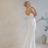 Intentions crepe satin fit-and-flare wedding dress with sweetheart neckline and elegant open back.