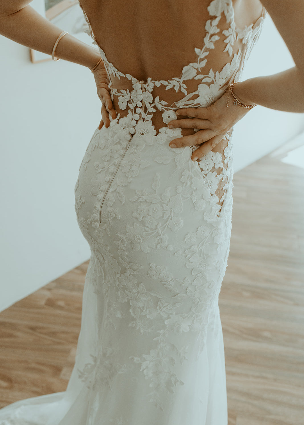 Basque Waist Wedding Dress with a fitted silhouette and intricate detailing.