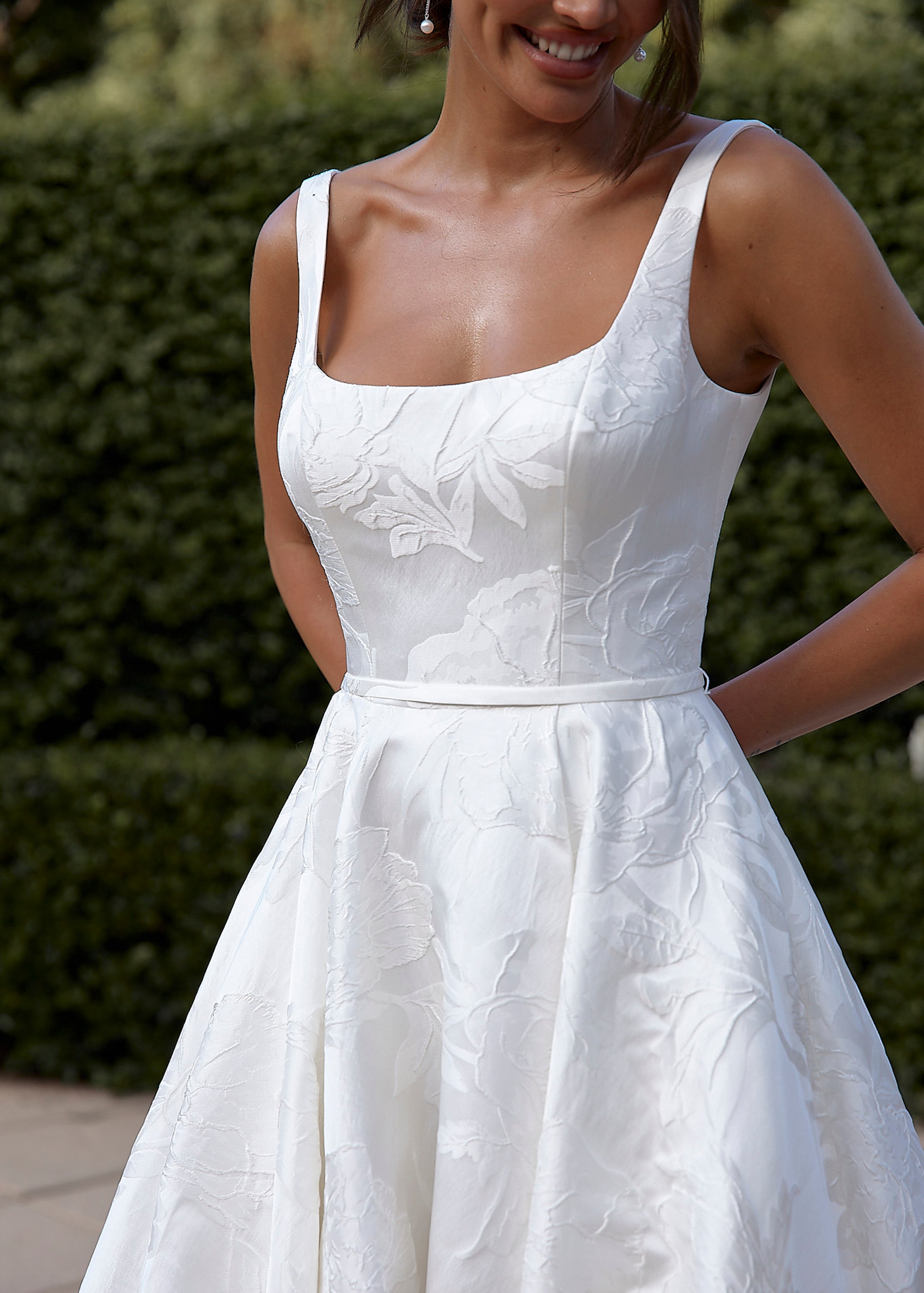 closeup of a bride wearing a Jacquard Satin A-Line Wedding Dress