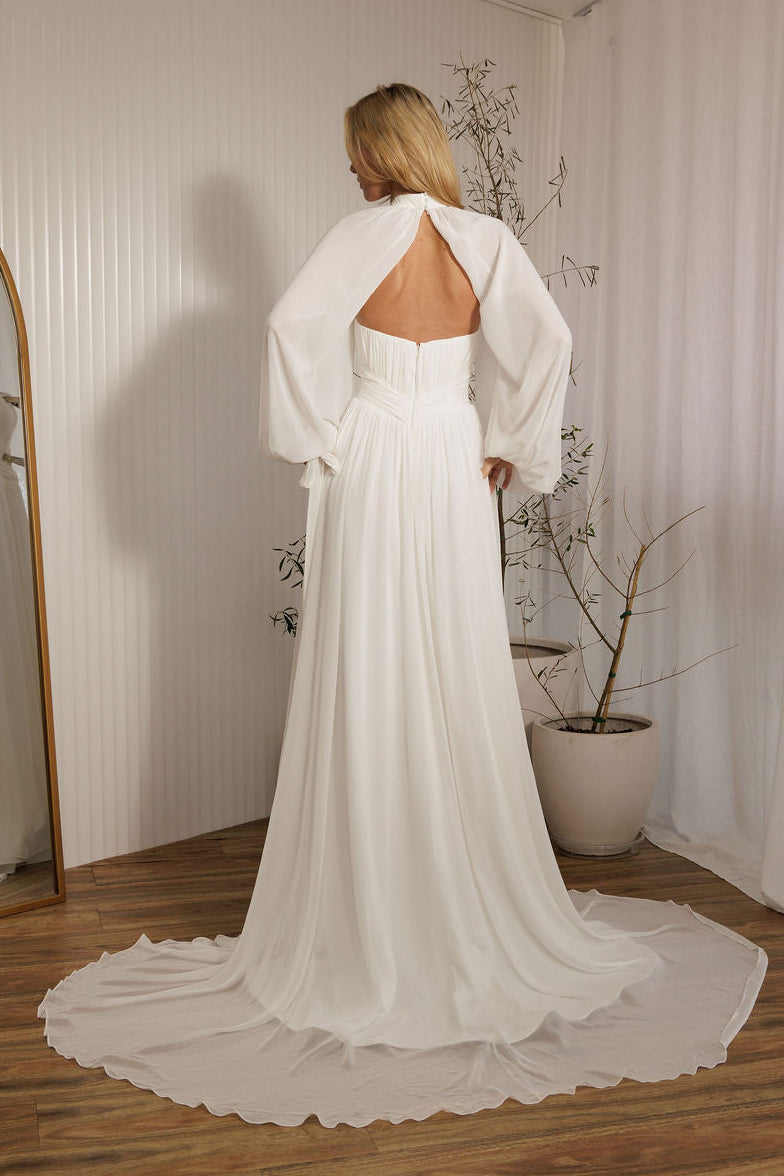 Ophelia romantic chiffon wedding dress back view with flowing chiffon skirt and billowy sleeves