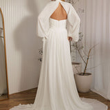 Ophelia romantic chiffon wedding dress back view with flowing chiffon skirt and billowy sleeves