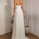 Ophelia designer romantic chiffon wedding dress back view with flowing skirt
