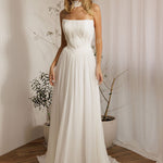 Elegant ivory romantic chiffon wedding dress  with pleated bodice and soft romantic style