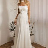 Elegant ivory romantic chiffon wedding dress  with pleated bodice and soft romantic style
