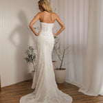 Back view of Prague beaded crepe fit-and-flare wedding dress with lace-up corset bodice and train