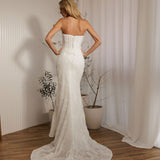 Back view of Prague beaded crepe fit-and-flare wedding dress with lace-up corset bodice and train