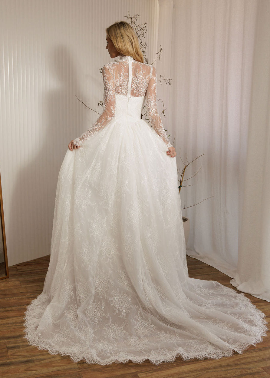 Back view of Vivaldi lace A-line wedding dress with detachable lace bodysuit and full lace skirt train