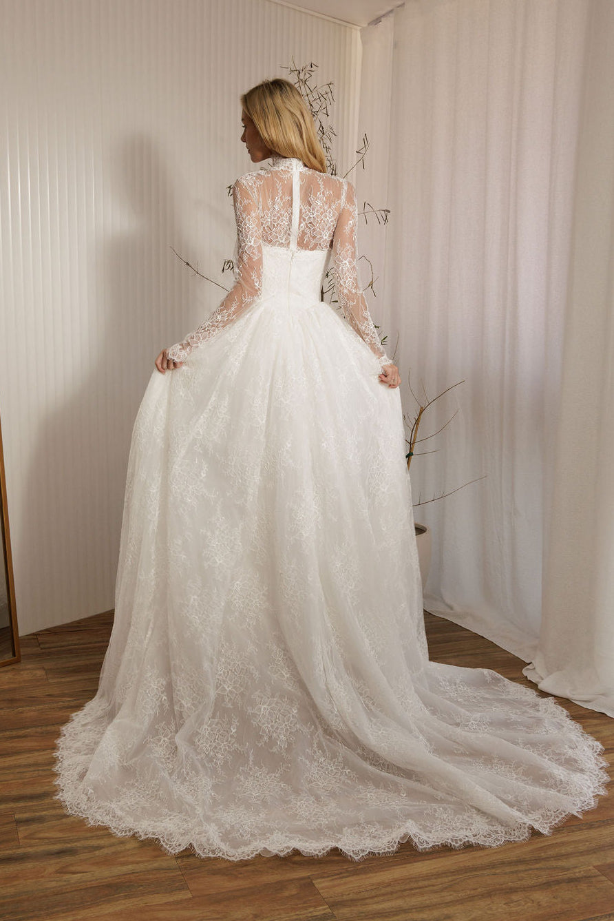 Back view of Vivaldi lace A-line wedding dress with detachable lace bodysuit and full lace skirt train
