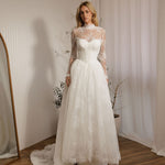 Detachable lace bodysuit over Vivaldi lace A-line wedding dress with Basque waist bodice and full lace skirt