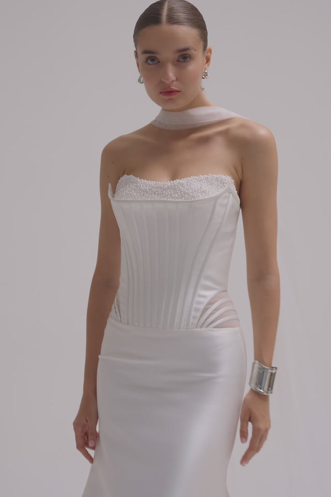 Bride wearing a dropped waist Mikado fitted wedding dress